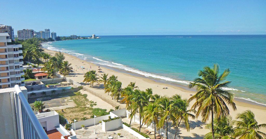 Unbeatable view from balcony down Isla Verde Beach