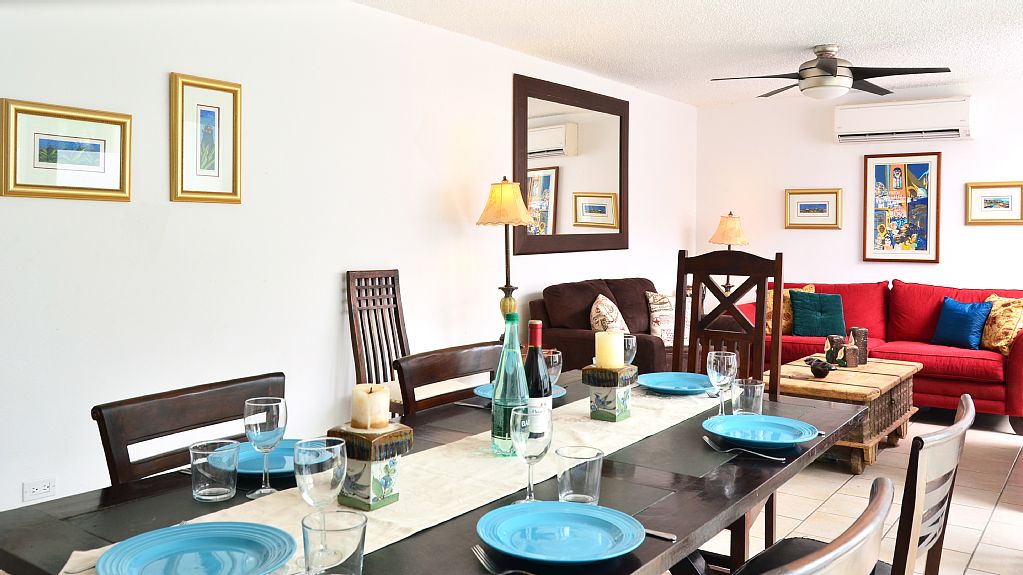 Spacious dining room and living room areas.