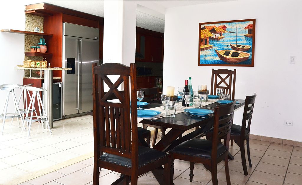 View from the living room toward the dining and kitchen area