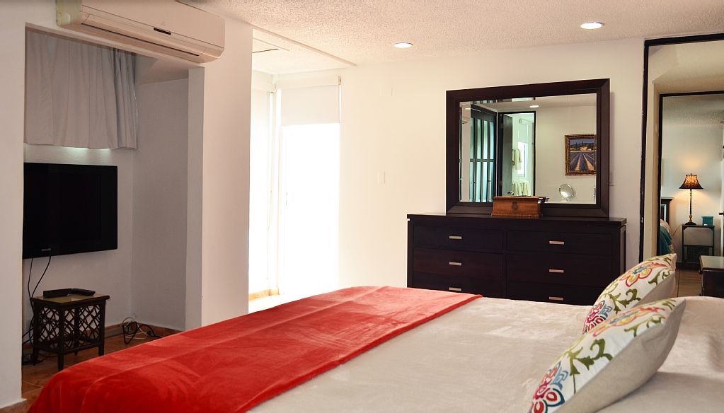 Master bedroom has a King sized bed and en-suite bathroom.