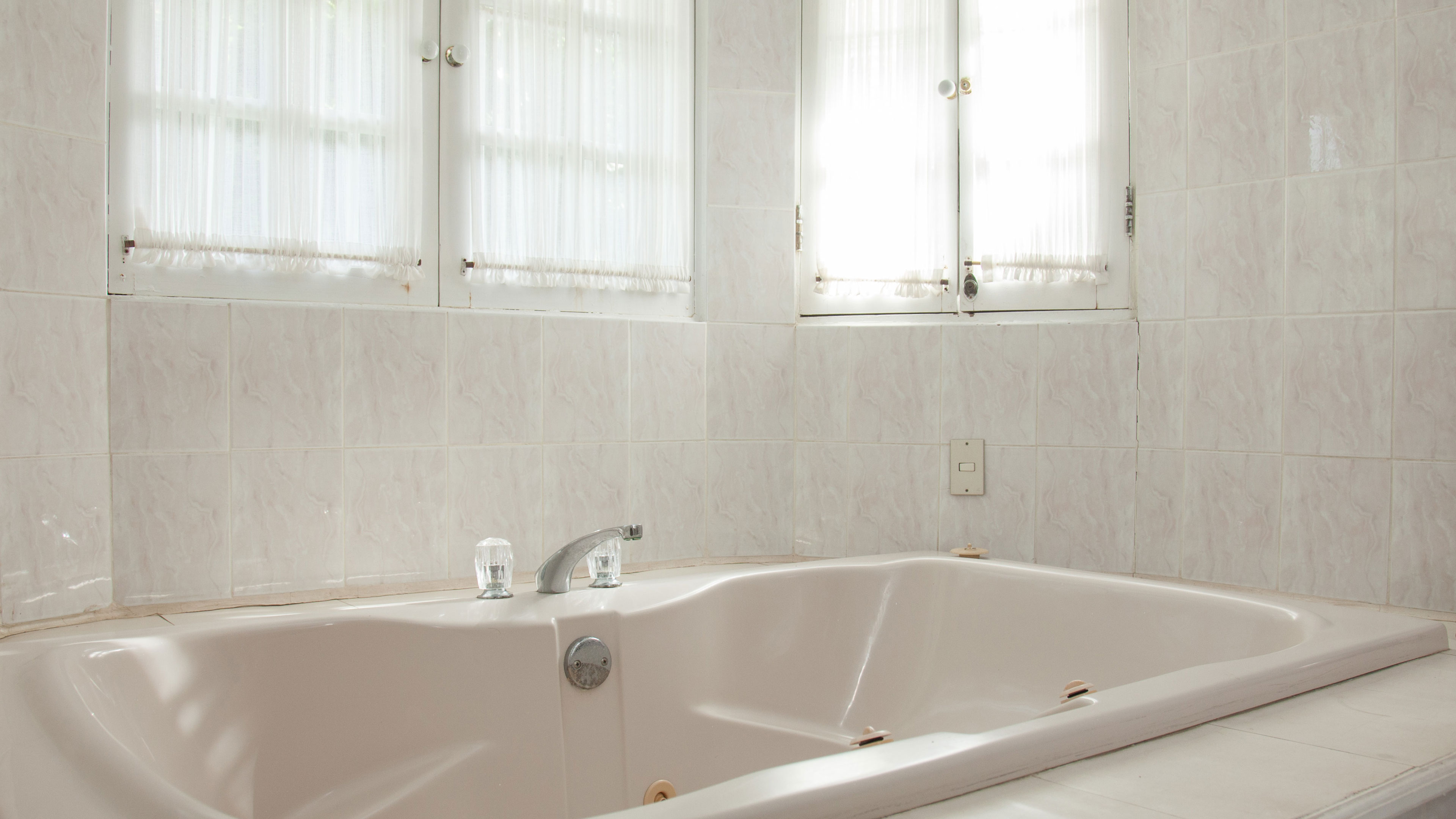 Hot tub in the master bathroom. Shower also available.