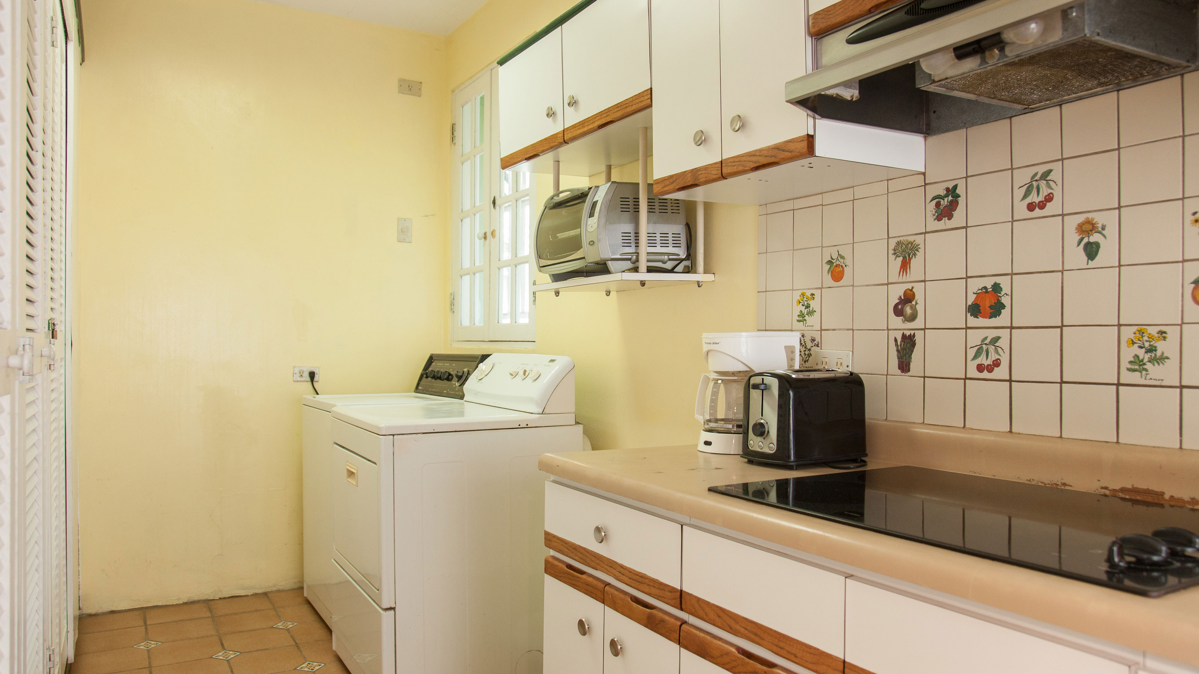 Washer and dryer included in the house.