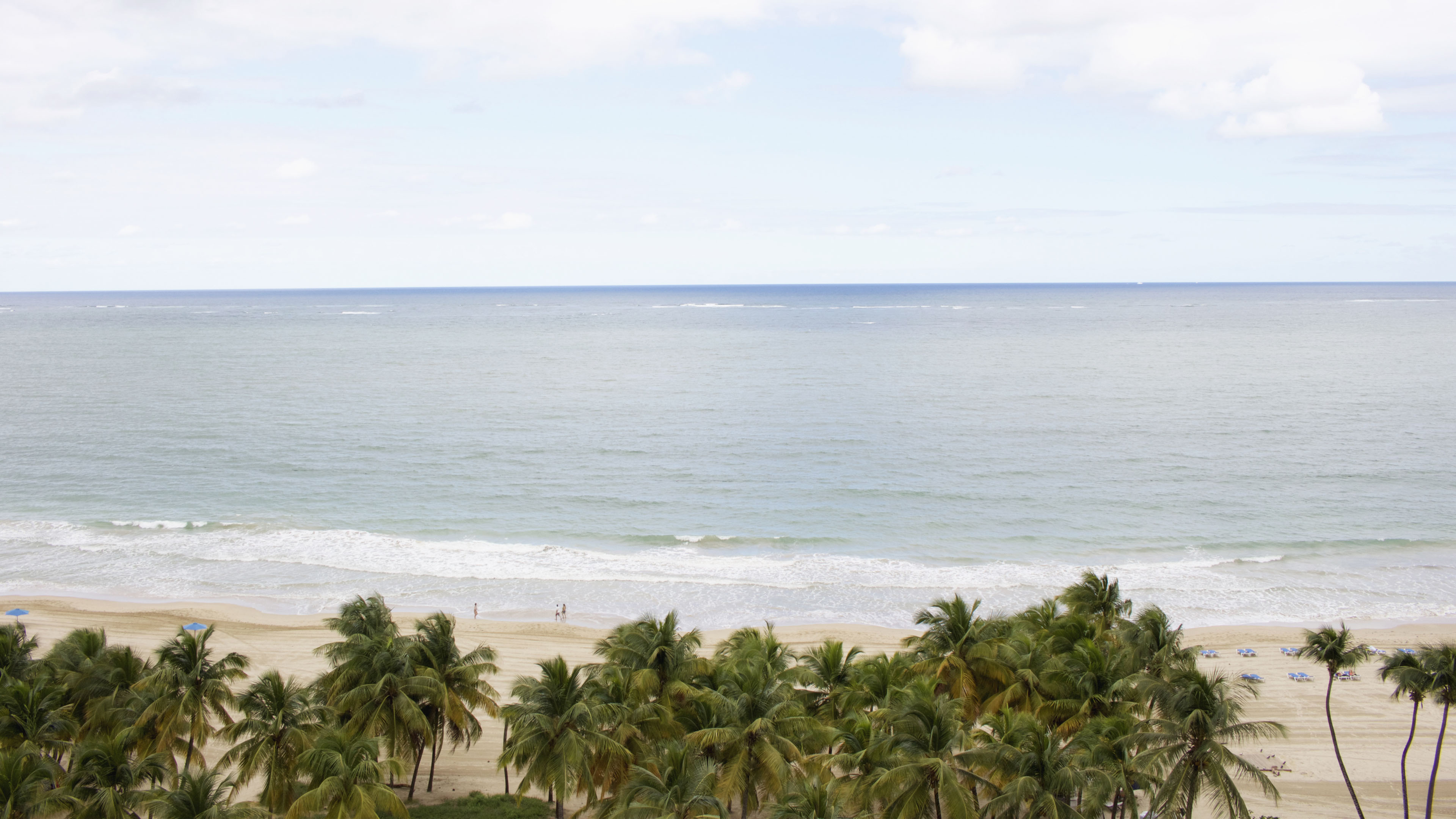 Isla Verde Beach at your feet.