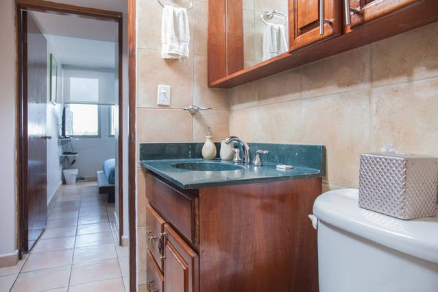 Second bathroom is located across the hallway from bedroom.