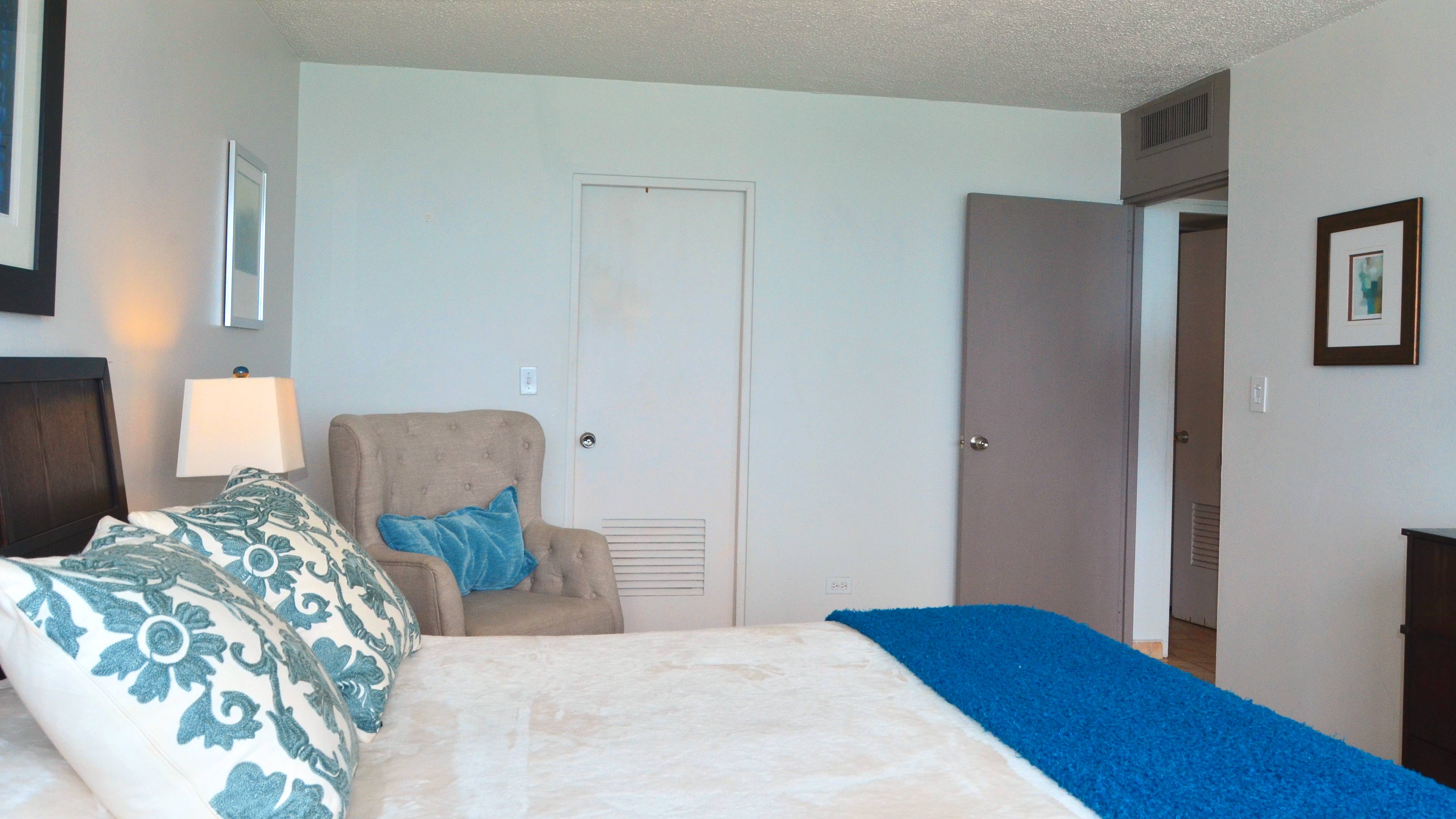 Walk-in closet in master bedroom.