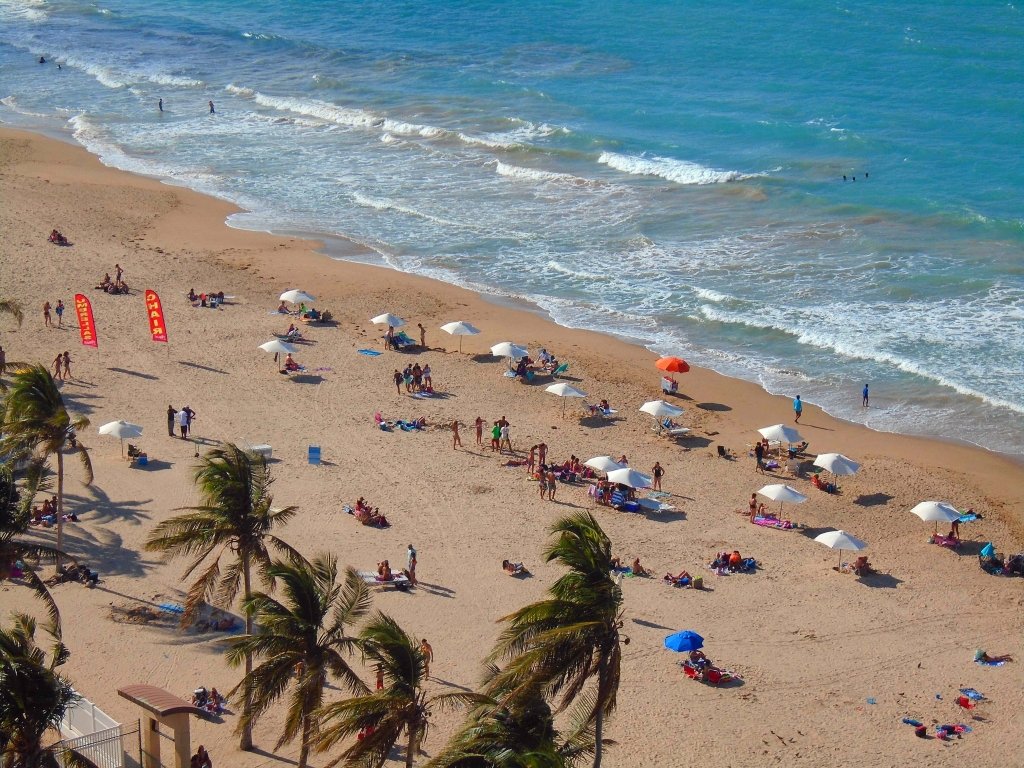 Beach chairs, a cooler and umbrella provided in the unit.