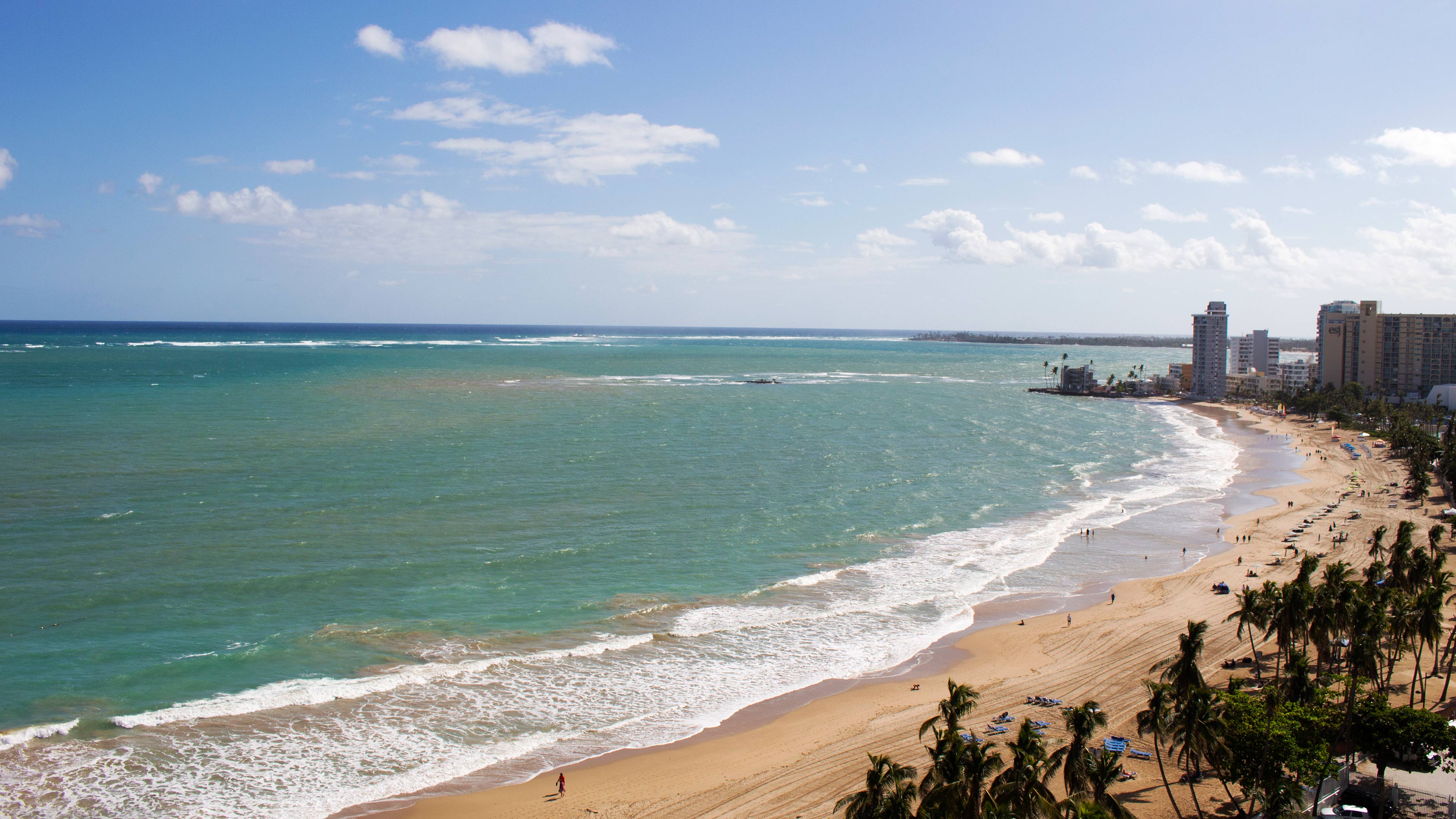 Isla Verde Beach at your feet.