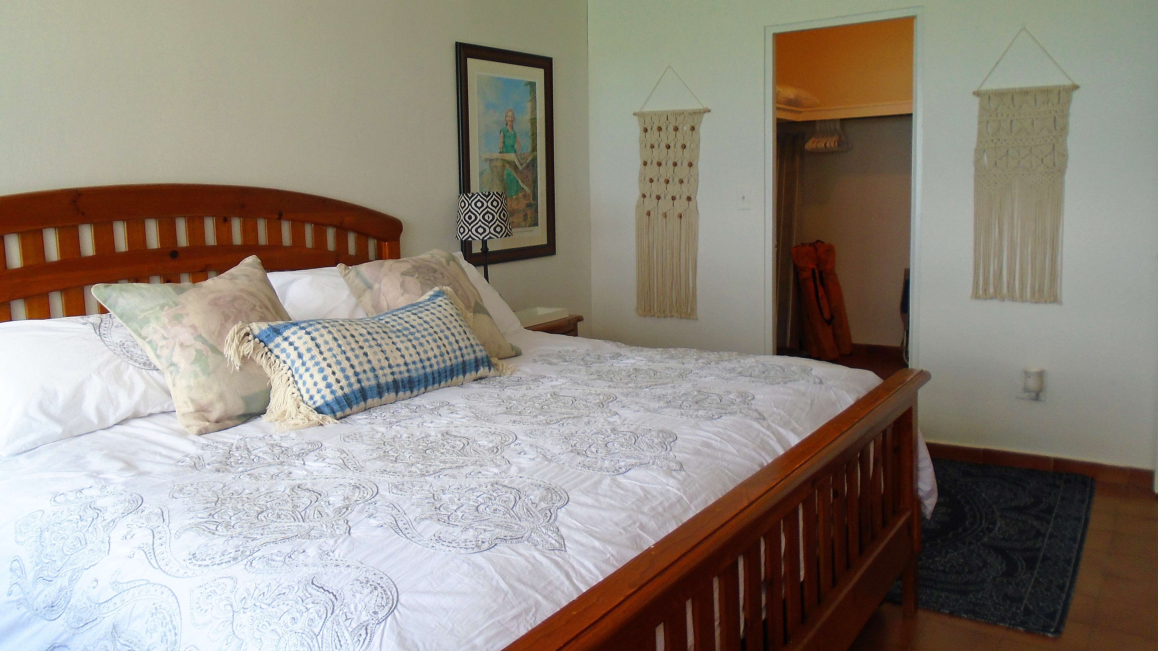 Walk-in closet in master bedroom.