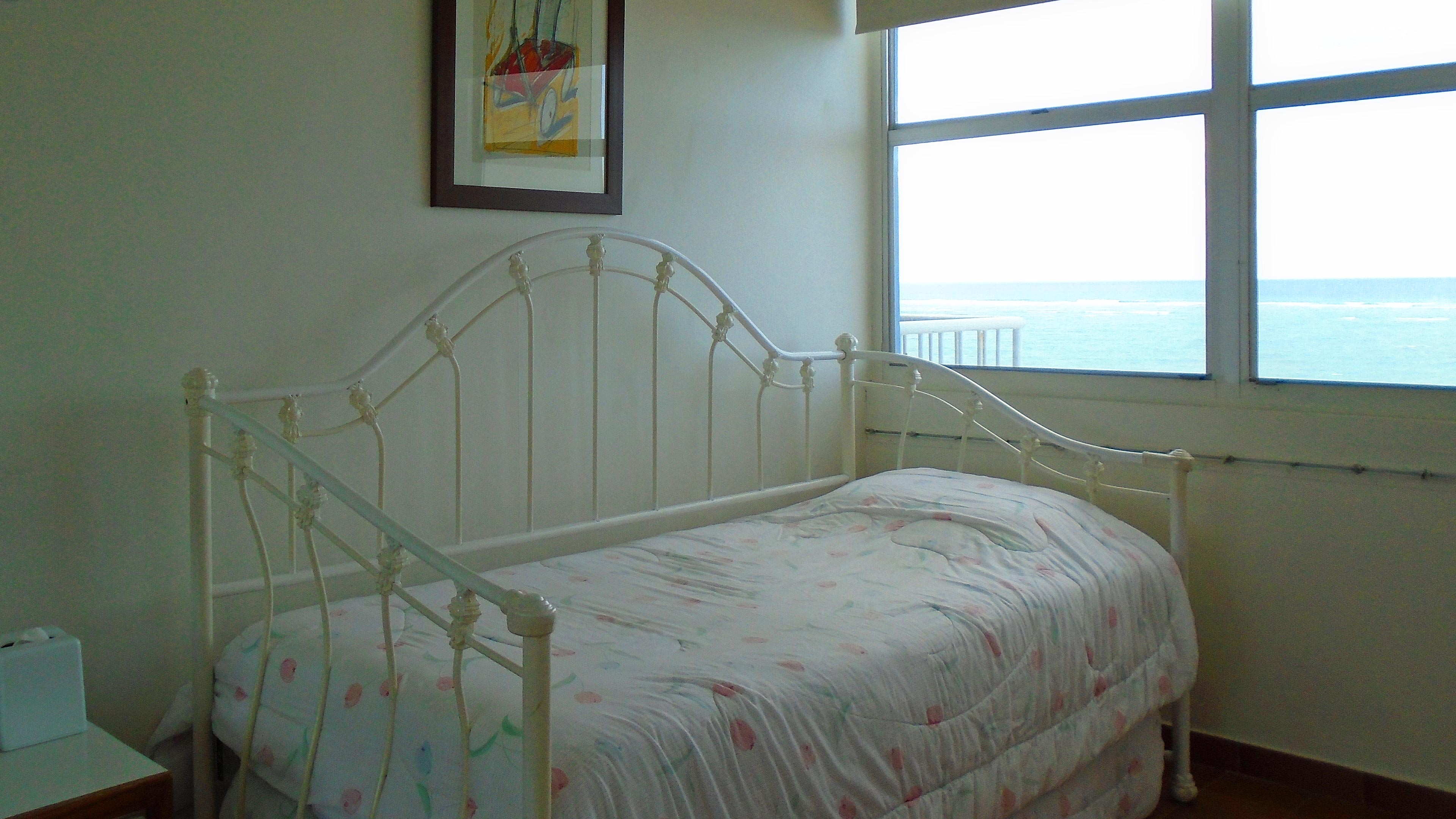 Second bedroom has two single trundle beds.