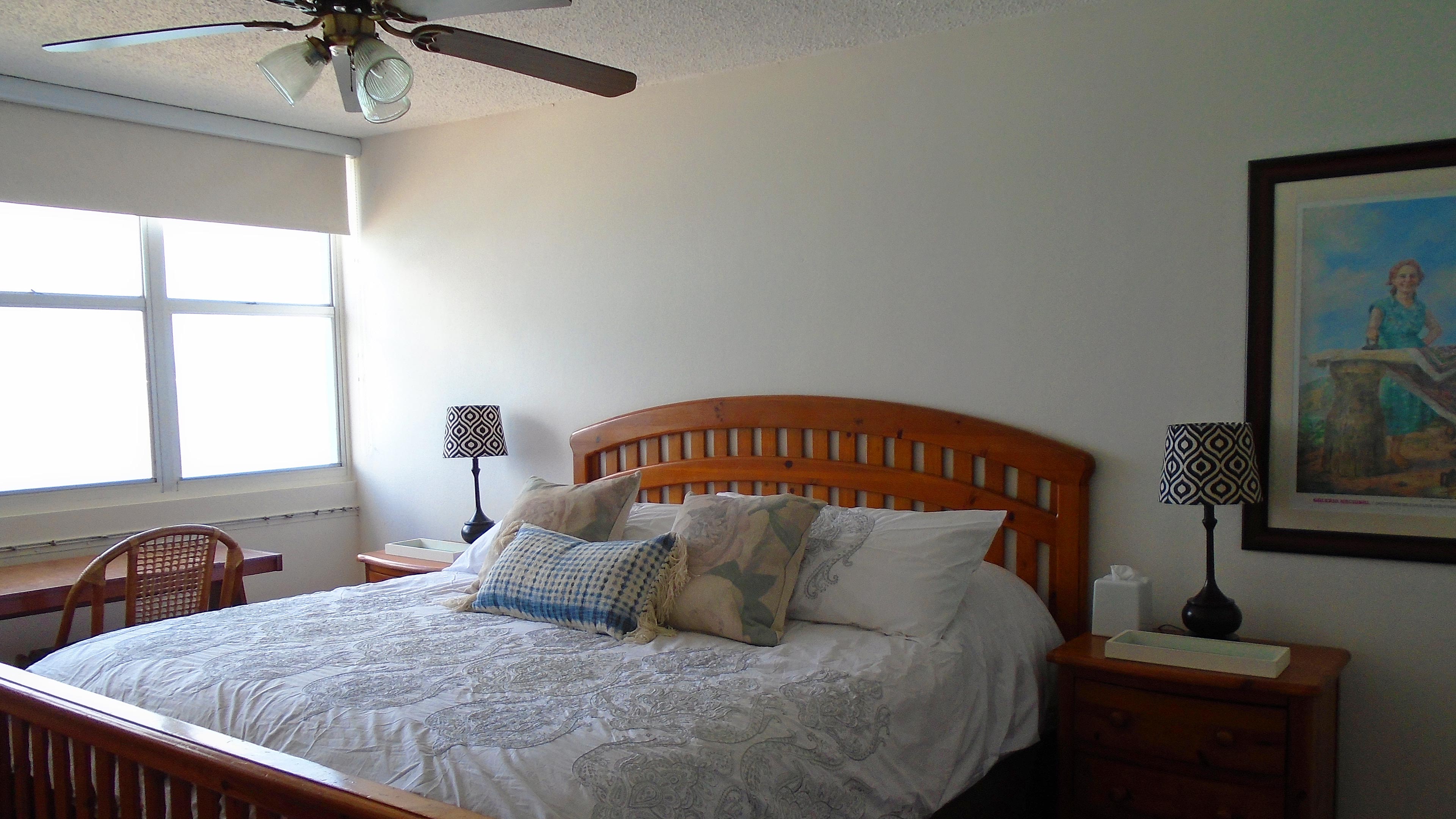 Master bedroom has a sumptuous King sized bed.