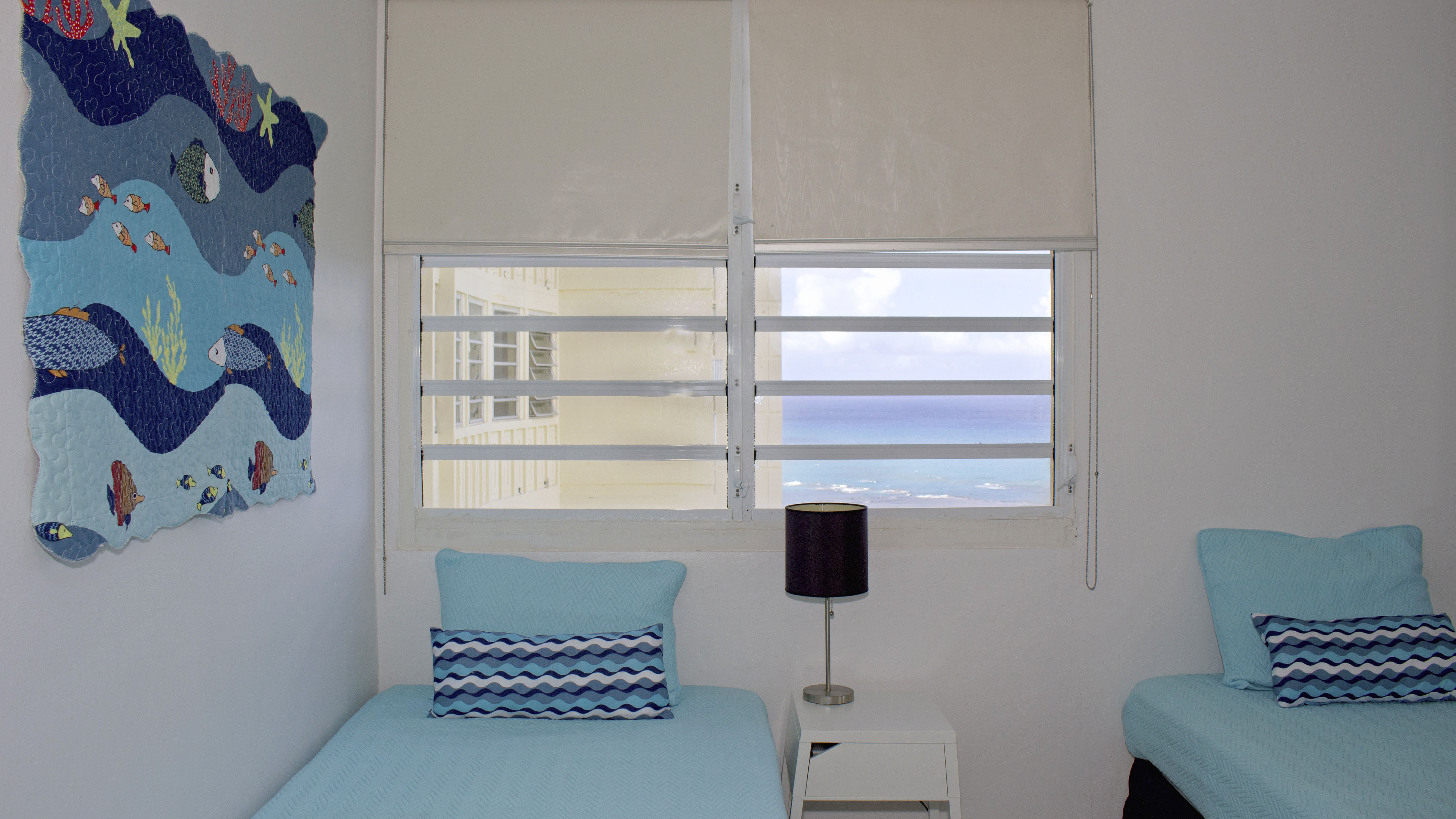 Second bedroom has two single beds and a great water view.