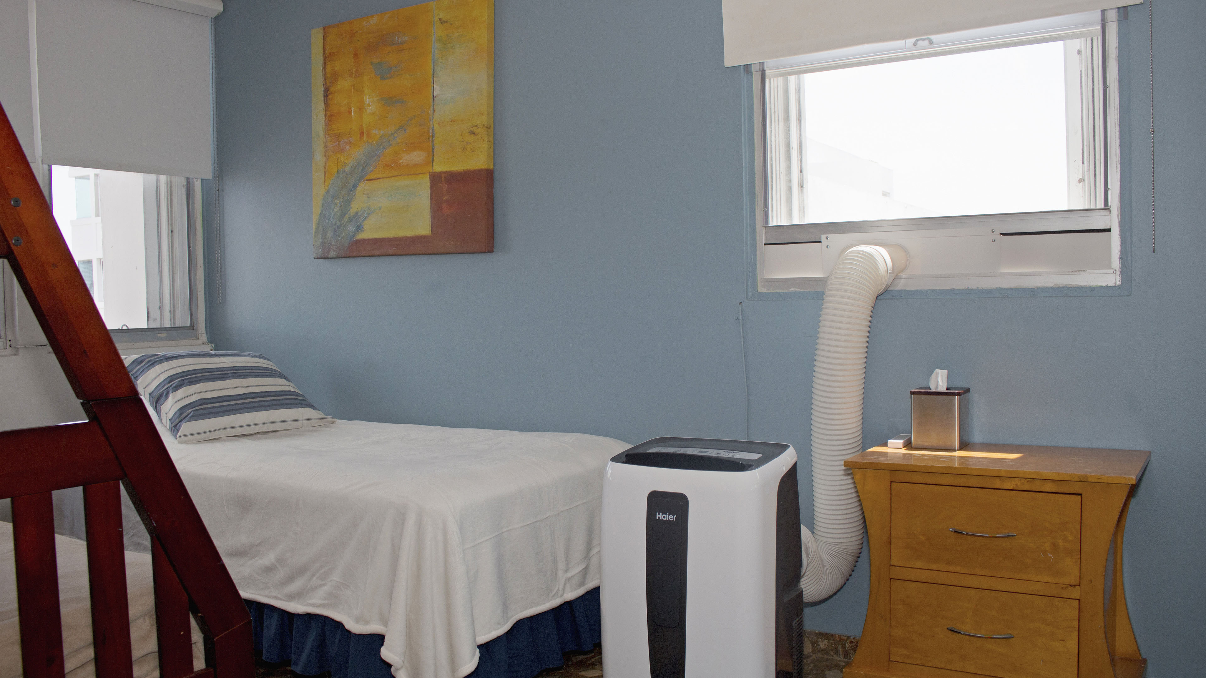 Portable a/c units in each bedroom.