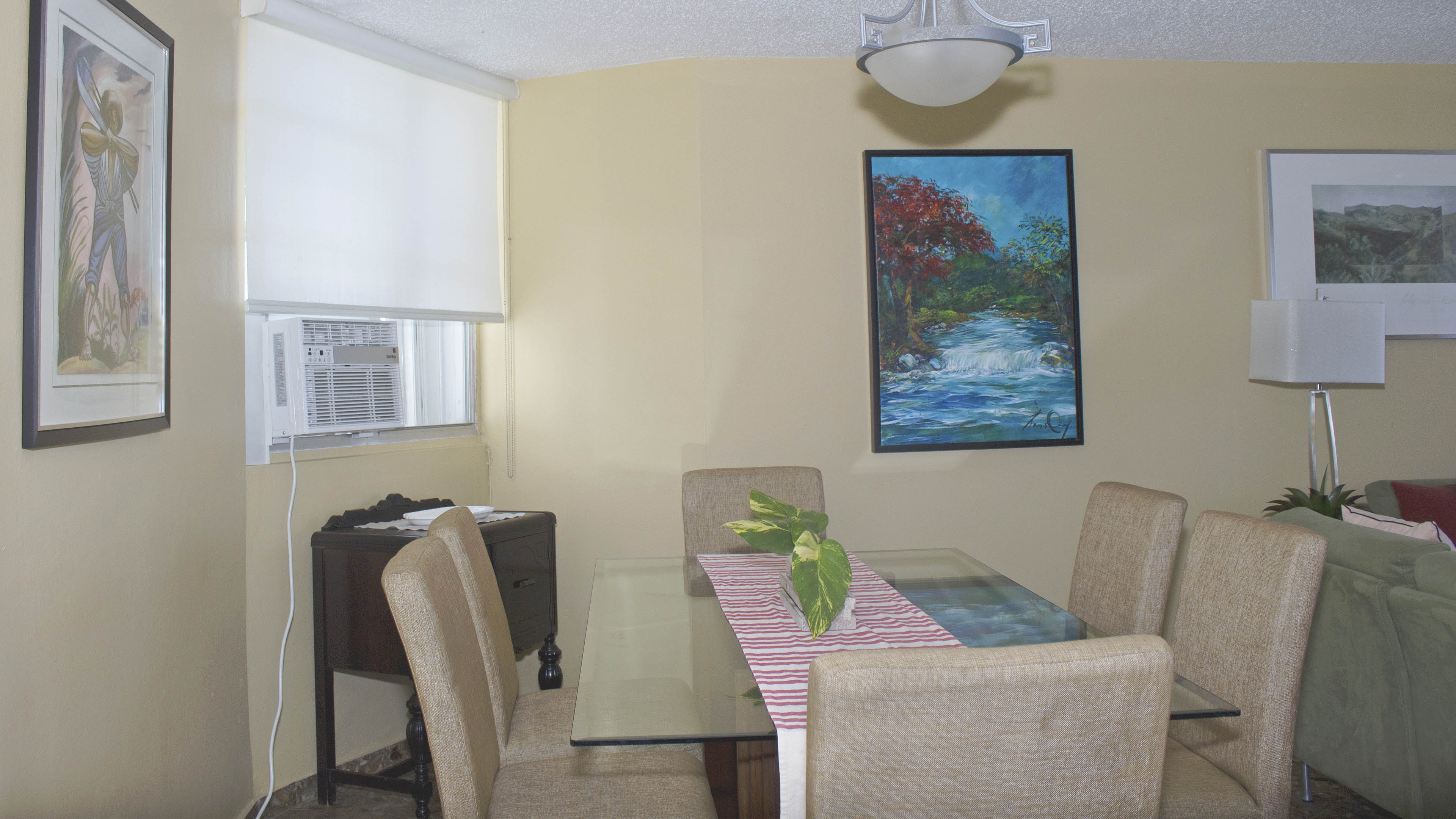 Dining room accommodates six guests comfortably.